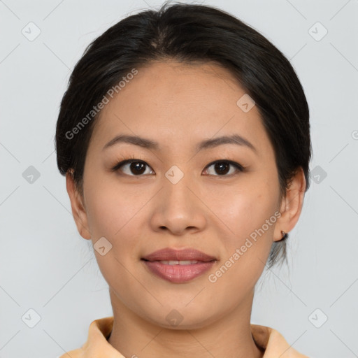 Joyful asian young-adult female with short  brown hair and brown eyes