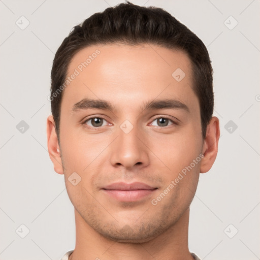 Joyful white young-adult male with short  brown hair and brown eyes