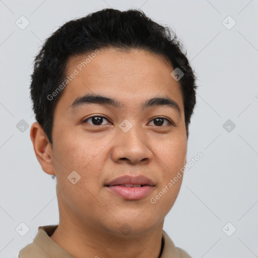 Joyful asian young-adult male with short  brown hair and brown eyes