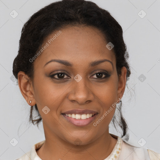 Joyful black young-adult female with medium  brown hair and brown eyes