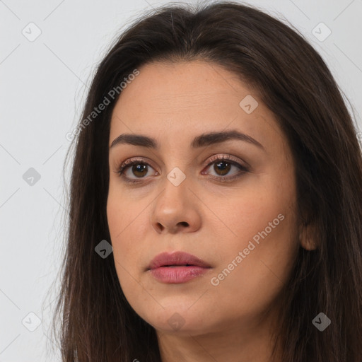 Neutral white young-adult female with long  brown hair and brown eyes