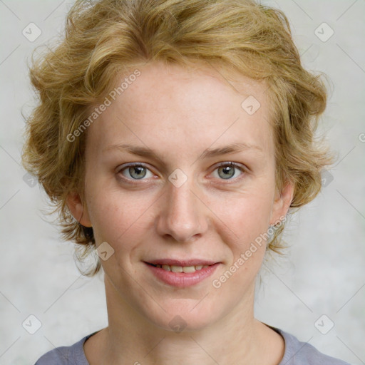 Joyful white young-adult female with medium  brown hair and blue eyes