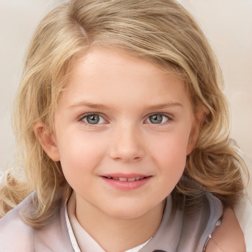 Joyful white child female with medium  blond hair and blue eyes