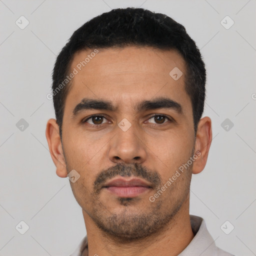 Neutral latino young-adult male with short  black hair and brown eyes