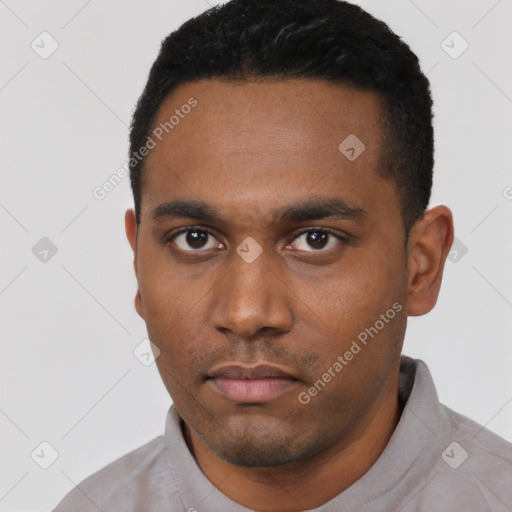Neutral latino young-adult male with short  black hair and brown eyes