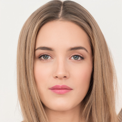 Neutral white young-adult female with long  brown hair and brown eyes