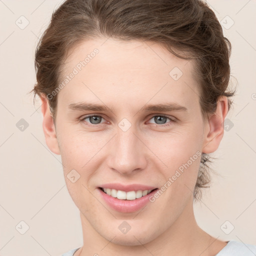 Joyful white young-adult female with short  brown hair and grey eyes