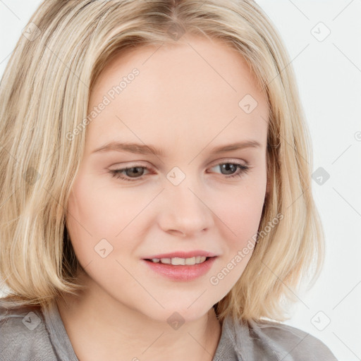 Joyful white child female with long  brown hair and blue eyes