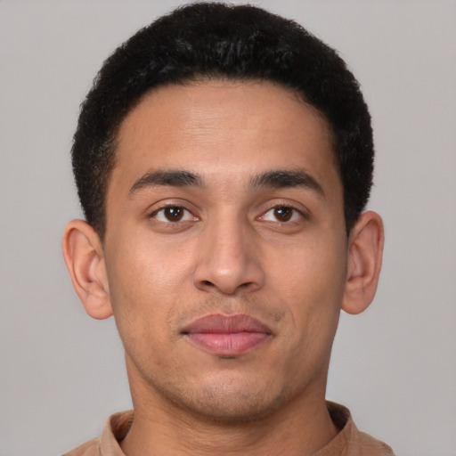 Neutral latino young-adult male with short  brown hair and brown eyes