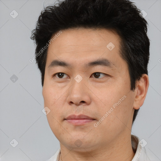 Neutral asian young-adult male with short  brown hair and brown eyes