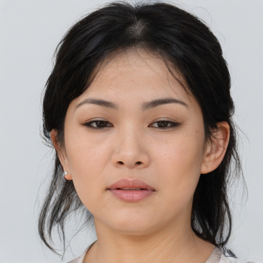 Neutral asian young-adult female with medium  brown hair and brown eyes