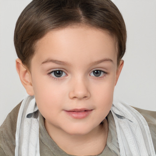 Joyful white child female with short  brown hair and brown eyes