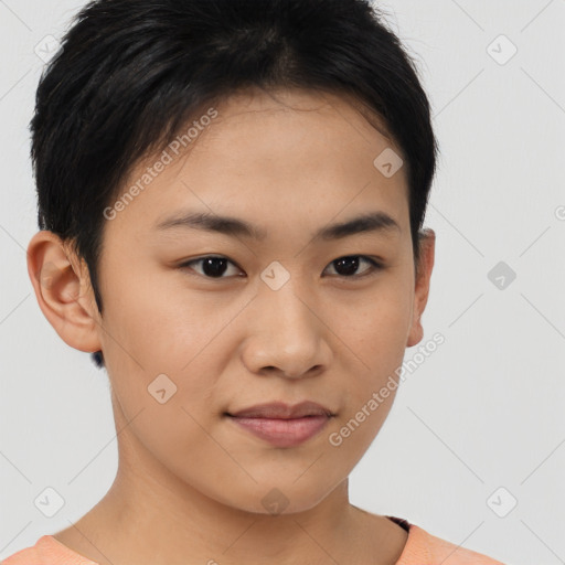 Joyful asian young-adult female with short  brown hair and brown eyes