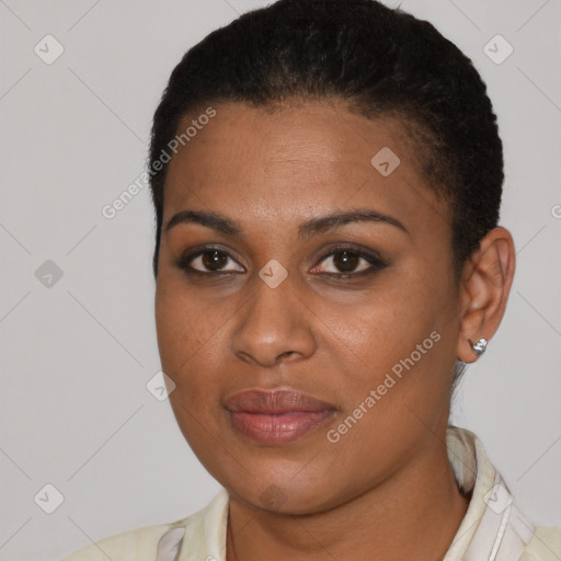 Joyful black young-adult female with short  brown hair and brown eyes