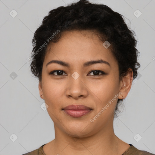 Joyful latino young-adult female with short  brown hair and brown eyes