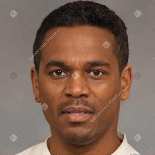 Neutral latino young-adult male with short  brown hair and brown eyes