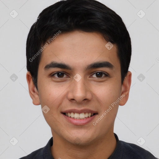 Joyful asian young-adult male with short  black hair and brown eyes