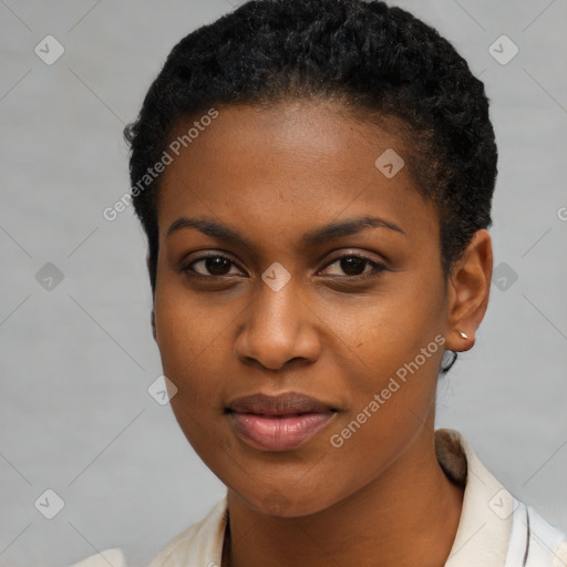 Joyful black young-adult female with short  brown hair and brown eyes