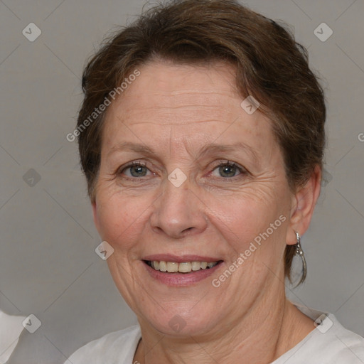 Joyful white adult female with short  brown hair and brown eyes