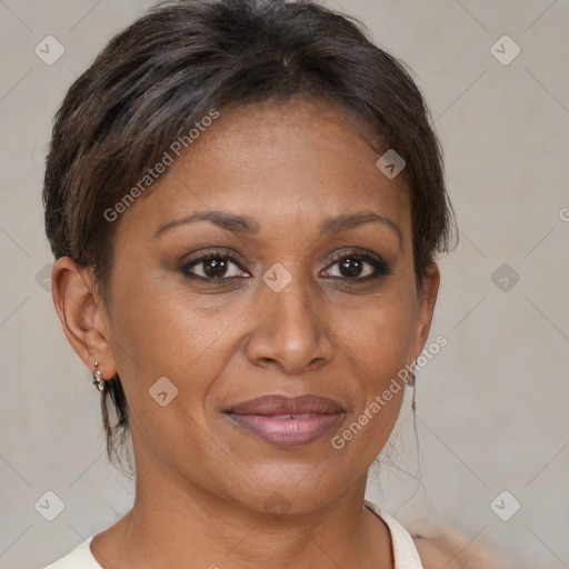 Joyful white adult female with short  brown hair and brown eyes