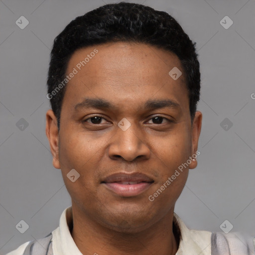 Joyful black young-adult male with short  black hair and brown eyes