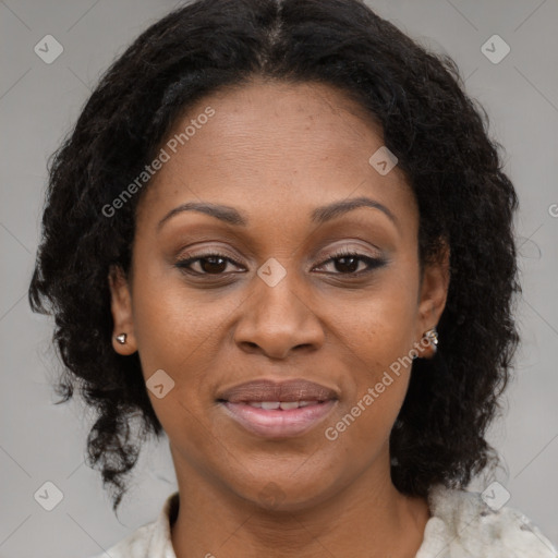 Joyful latino adult female with medium  brown hair and brown eyes