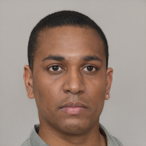 Neutral latino young-adult male with short  brown hair and brown eyes