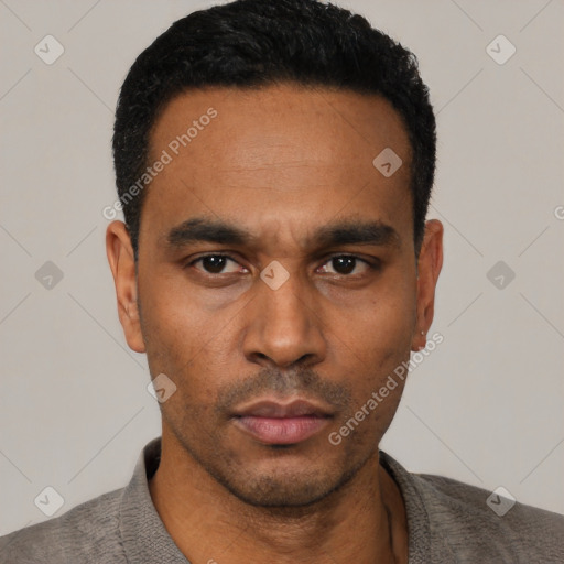 Neutral latino young-adult male with short  black hair and brown eyes