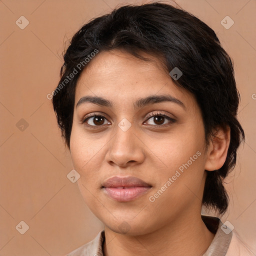 Joyful latino young-adult female with medium  brown hair and brown eyes