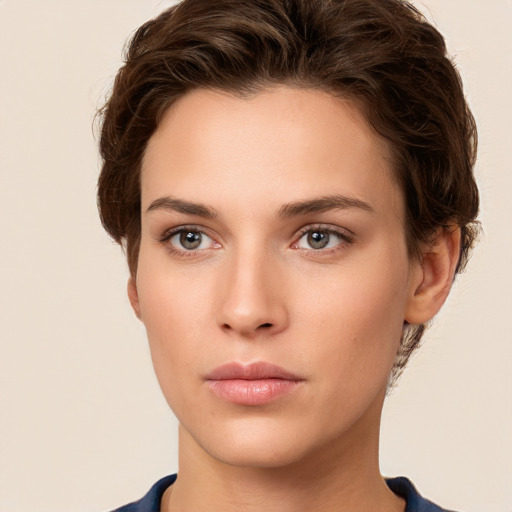 Neutral white young-adult female with short  brown hair and brown eyes