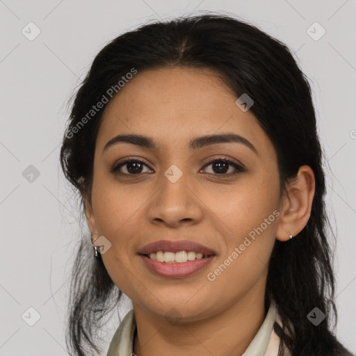 Joyful latino young-adult female with long  brown hair and brown eyes