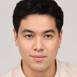 Neutral asian young-adult male with short  brown hair and brown eyes