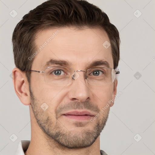 Joyful white adult male with short  brown hair and grey eyes