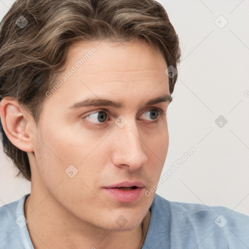 Neutral white young-adult male with short  brown hair and grey eyes