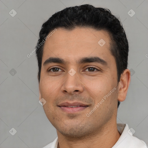 Neutral latino young-adult male with short  black hair and brown eyes