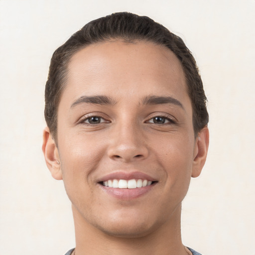 Joyful white young-adult female with short  brown hair and brown eyes