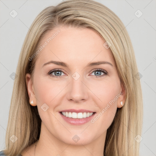 Joyful white young-adult female with long  brown hair and blue eyes