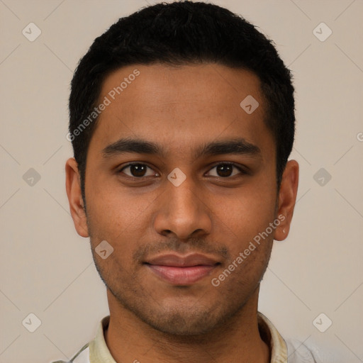 Joyful latino young-adult male with short  black hair and brown eyes