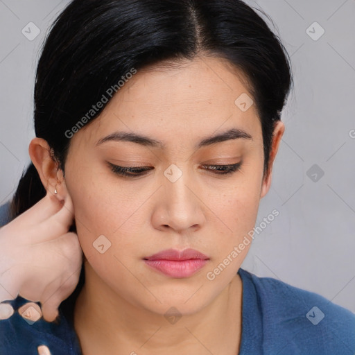 Neutral asian young-adult female with medium  brown hair and brown eyes