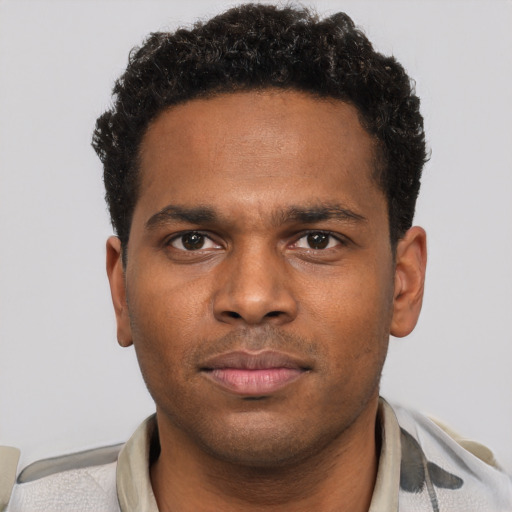 Neutral black young-adult male with short  brown hair and brown eyes