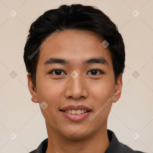 Joyful asian young-adult male with short  black hair and brown eyes