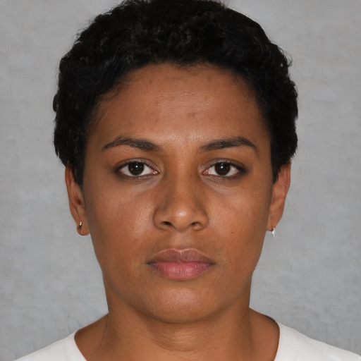 Neutral black young-adult female with short  black hair and brown eyes