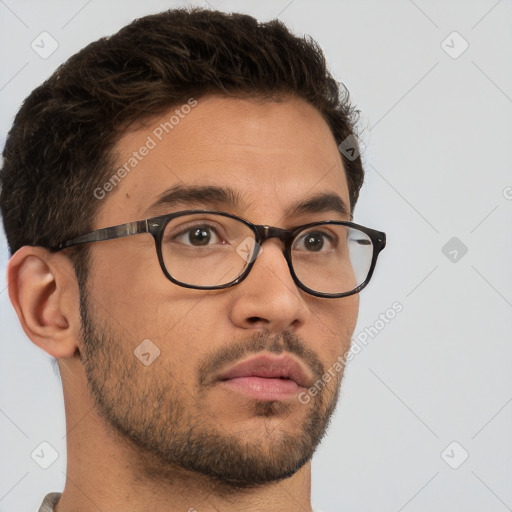 Neutral white young-adult male with short  brown hair and brown eyes