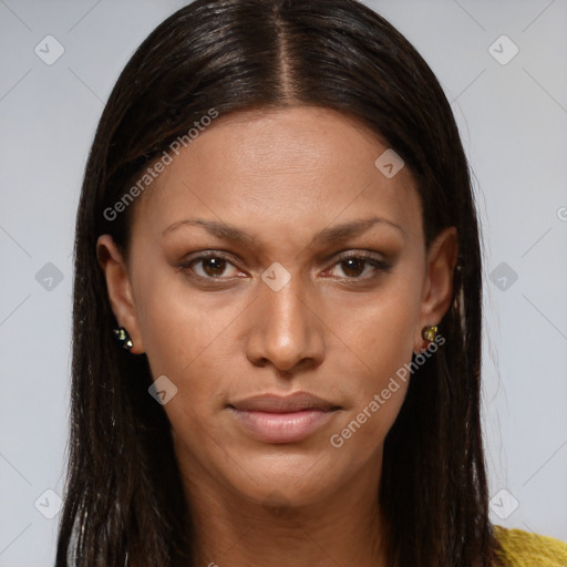 Joyful black young-adult female with long  brown hair and brown eyes