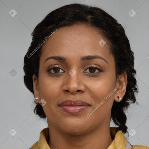 Joyful black young-adult female with medium  brown hair and brown eyes