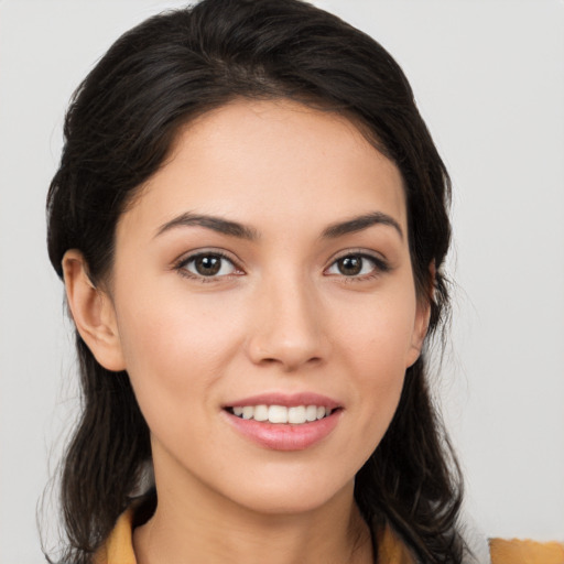 Joyful white young-adult female with medium  brown hair and brown eyes