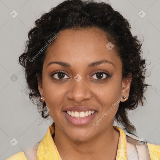 Joyful black young-adult female with medium  brown hair and brown eyes