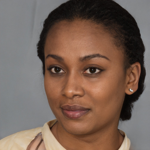 Neutral latino young-adult female with short  black hair and brown eyes