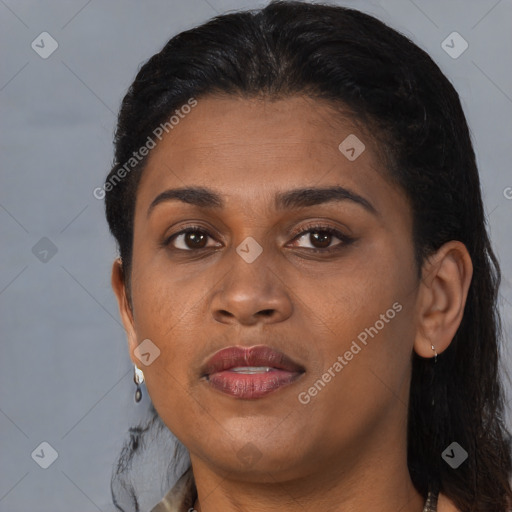 Joyful black young-adult female with medium  brown hair and brown eyes