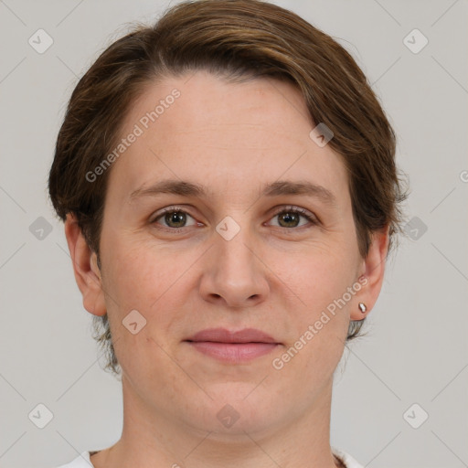 Joyful white adult female with short  brown hair and grey eyes